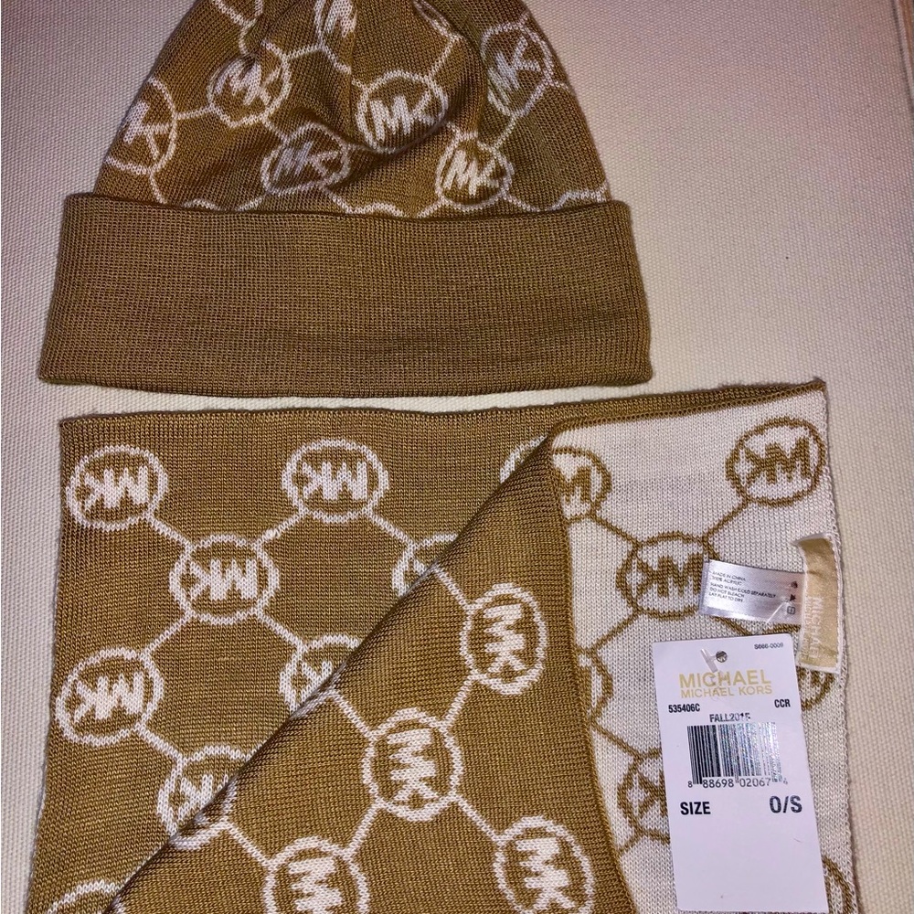Brand new Michael Kors scarf and beanie set. Off white/tan in matching design.
